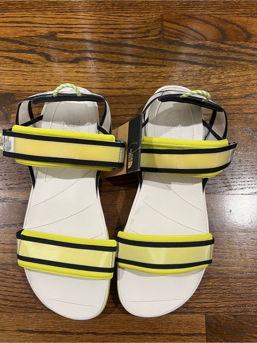 The North Face Skeena sport sandals, featuring a white footbed and bright yellow
